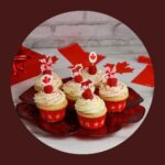 CUPCAKE CANDLE (WITH SMALL FLAGS ON IT (1)