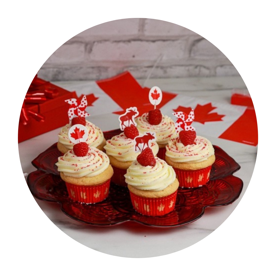 CUPCAKE CANDLE (WITH SMALL FLAGS ON IT